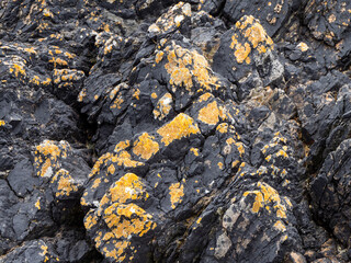 Beautiful rock deposits as a background. Stone layers close-up, full frame. Stone.