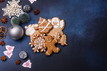 Christmas composition with gingerbread cookies, Christmas toys, pine cones and spices