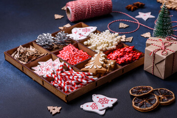 Christmas composition with gingerbread cookies, Christmas toys, pine cones and spices