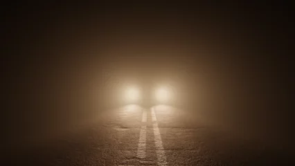 Fotobehang Ominous car parked in middle of road at night shining blinding headlights © Crane Design