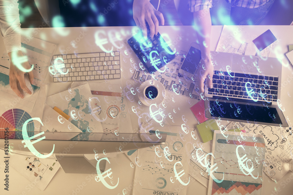 Poster multi exposure of man and woman working together and financial chart hologram. business concept. com