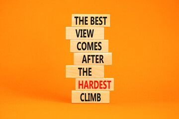 Best view after the hardest climb symbol. Concept words The best view comes after the hardest climb on blocks on a beautiful orange table orange background. Business success concept. Copy space
