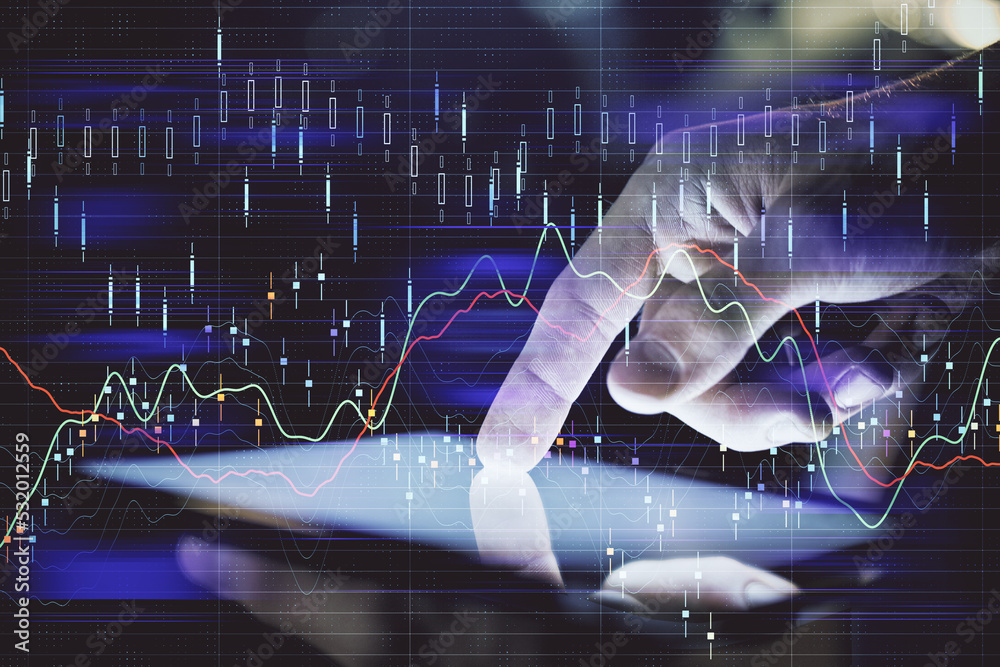 Poster double exposure of man's hands holding and using a digital device and forex graph drawing. financial