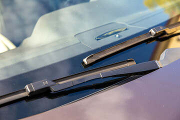 Car wipers on glass close up