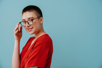 Young woman wearing eyeglasses smiling and looking at camera