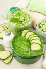 Homemade cosmetics with cucumber. Natural cream, sea salt, body lotion, and soap