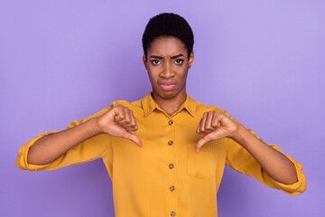 Photo of young girl guy show thumb-down dislike displeased no decline denial isolated over purple...