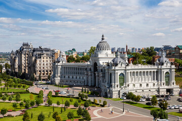 View from the Kazan Kremlin to Kazan and the Palace of Farmers on a sunny summer day. Kazan, Russia