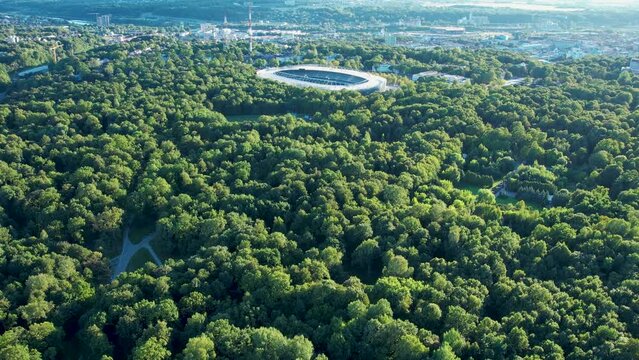Newly reconstructed Kaunas Darius and Girenas football stadium, largest in Lithuania. Aerial view photo of a multi-use stadium in Azuolynas park. 4K aerial video