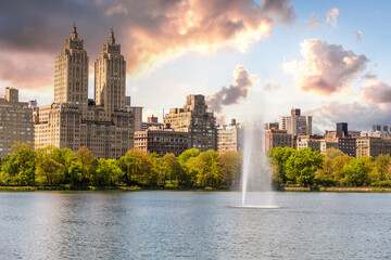Skyline panorama with Eldorado building and reservoir with fountain in Central Park in midtown...