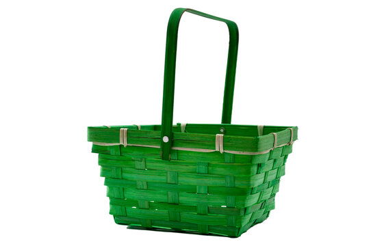 Ornamental empty green wicker basket isolated on white background with clipping path cutout concept for independent supermarket, buy from a local farmer and authentic ecological economics