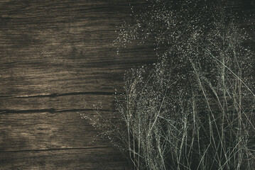 Close-Up Of Dry Grass On Wooden Table