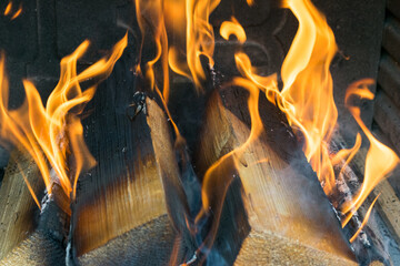 View of burning wood in the fireplace