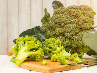 Lots of broccoli for diet and healthy eating. Fresh green broccoli on the table. Organic products