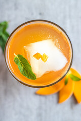 cup of tea with lemon and a mint leaf. top view