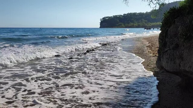 Splash sea  waves at Antalya bay. Kemer beach, Antalya, Turkey. Turkiye