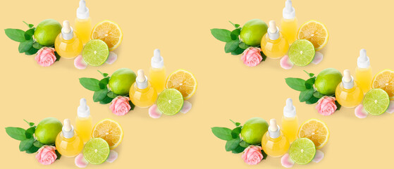 Many bottles of citrus cosmetic serum on beige background