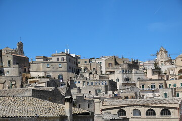 Obraz premium The old town of Matera under a blue sky, Italy