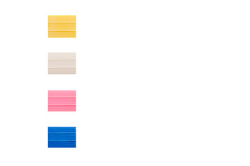 chalk for fabric, sewing, white, pink, blue, yellow on a white background