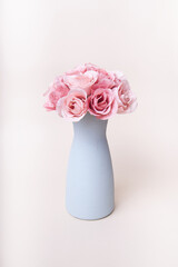Romantic rose flower bouquet in ceramic vase