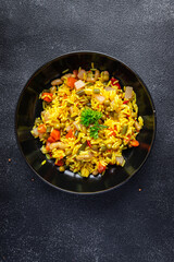 rice vegetables vegetarian pilaf without meat healthy meal food snack diet on the table copy space food background rustic top view keto or paleo diet veggie vegan or vegetarian food no meat