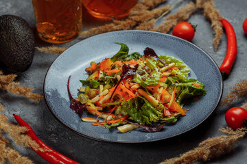 Sicilian salad with fennel, oranges, grapefruit and radicchio salad with balsamic dressing on a blue linen tablecloth. healthy summer italian food