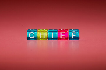 the word "chief" made up of cubes	