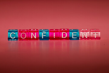 the word "confident" made up of cubes