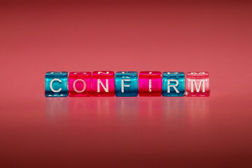 the word "confirm" made up of cubes