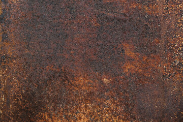 Dark light red rusty metal plate. Grunge texture. Rusty metal background. Rusty orange texture....