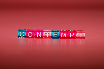 the word "contempt" made up of cubes
