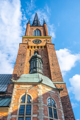 Fototapeta na wymiar Riddarholmen Church on sunny day in Stockholm