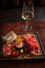 meat appetizer on the wooden tray