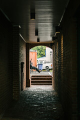 dark alley with man sitting - New Bern, NC