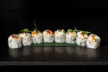 sushi on the black background
