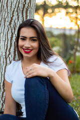 Beautiful brunette girl in a park