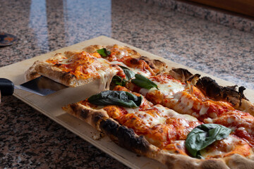 Square pizza on a marble place - 532045905
