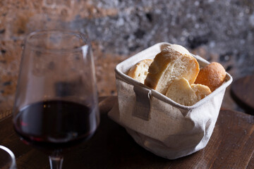 Basket of bread on a restaurant table (detail)