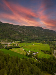 Fototapeta na wymiar Vertical aerial photo of Norway green mountains