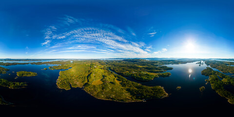 Aerial 360 islands of Norway with beautiful blue sky