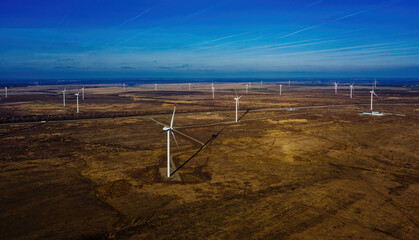 Fototapeta na wymiar Wind turbines at the countryside, aerial view