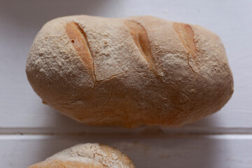 Homemade fresh bread on a table - 532047769
