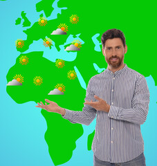 Handsome man near virtual screen with map that demonstrating weather forecast in different regions