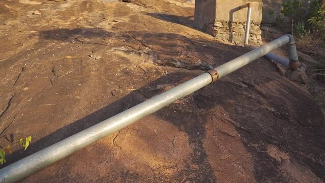 Water pipeline on a rock catchment area in Kenya. Africa