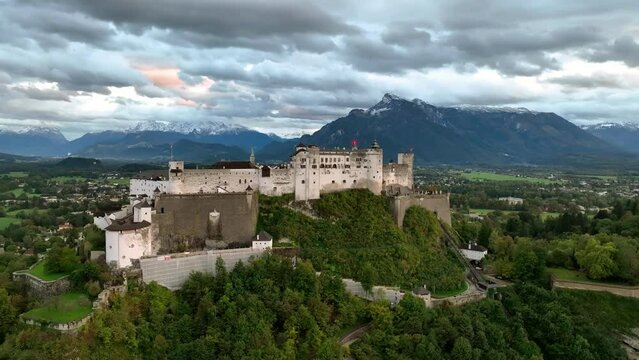 aerial view Salzburg Austria skyline of Salzburg castle river old town in 4k after sunset