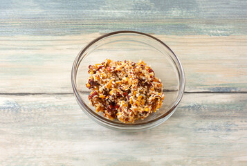 Spicy chili pepper flakes garlic and sesame seed cooking ingredient in glass bowl