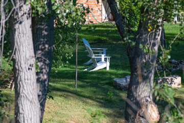 White chairs in the shade