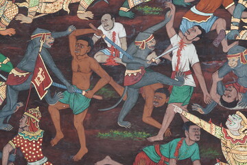Old wall paintings from 1930 tell the story of Thai literature. Written on the wall of Wat Phra Kaew Bangkok, Thailand Open for tourists to visit and take photos on 8 December 2020 © nopwaratch