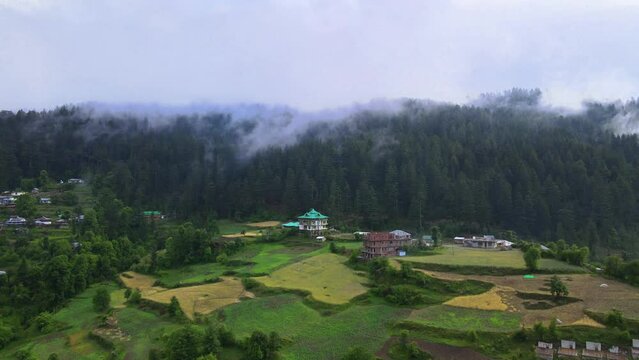 Drone Shot of a cloudy Sainj Valley in Himachal Pradesh near Manali, Kasol