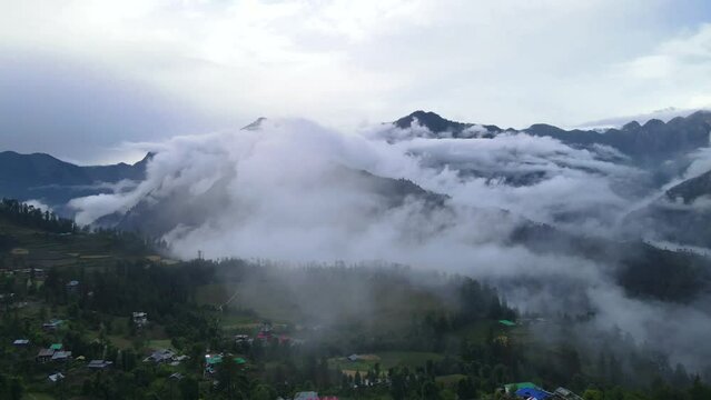 Drone Shot of a cloudy Sainj Valley in Himachal Pradesh near Manali, Kasol
